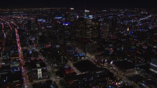 HD stock footage aerial video of flying away from the city's skyline at night in Downtown Los Angeles, California Aerial Stock Footage | CAP_018_174