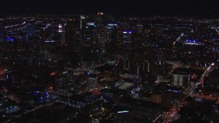 HD stock footage aerial video of flying past the city's skyline at night in Downtown Los Angeles, California Aerial Stock Footage | CAP_018_176