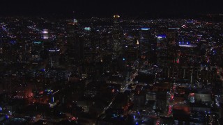 HD stock footage aerial video of flying by the city's skyline at night in Downtown Los Angeles, California Aerial Stock Footage | CAP_018_177