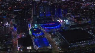 CAP_018_189 - HD stock footage aerial video of zooming to arena and theater at night, Downtown Los Angeles, California