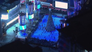 HD stock footage aerial video of an ice skating rink and Christmas tree at night, Downtown Los Angeles, California Aerial Stock Footage | CAP_018_192