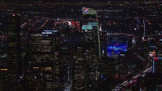 HD stock footage aerial video zoom to wider view of towering skyscrapers at night, Downtown Los Angeles, California Aerial Stock Footage | CAP_018_206