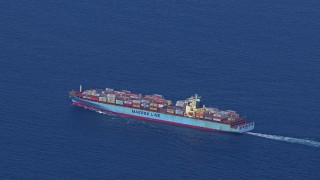 HD stock footage aerial video of tracking a cargo ship as it sails the ocean near Miami Beach, Florida Aerial Stock Footage | CAP_020_021