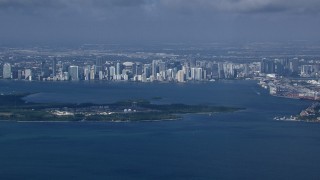 HD stock footage aerial video of a view of the Downtown Miami skyline across Biscayne Bay, Florida Aerial Stock Footage | CAP_020_028