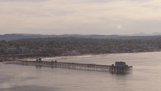 HD stock footage aerial video of flying away from Oceanside Pier with view of the community of Oceanside, California Aerial Stock Footage | CAP_021_025