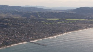 HD stock footage aerial video of a wide view of a pier by coastal neighborhoods in San Clemente, California Aerial Stock Footage | CAP_021_058