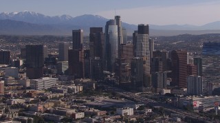 HD stock footage aerial video of flying by towering skyscrapers in the city's skyline, Downtown Los Angeles, California Aerial Stock Footage | CAP_021_099