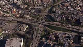 CAP_021_110 - HD stock footage aerial video of circling the 101 / 110 interchange with heavy traffic, Downtown Los Angeles, California