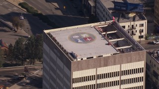 HD stock footage aerial video of orbiting the roof of an office building in Echo Park, Los Angeles, California Aerial Stock Footage | CAP_021_113