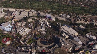 CAP_021_123 - HD stock footage aerial video orbit Universal Studios Hollywood theme park, Universal City, California