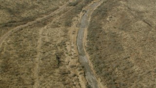 HD stock footage aerial video of a dry riverbed in the savanna, Zimbabwe Aerial Stock Footage | CAP_026_023