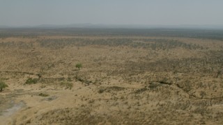 HD stock footage aerial video of panning across open savanna, Zimbabwe Aerial Stock Footage | CAP_026_028