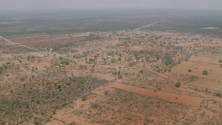 HD stock footage aerial video of approaching an African village in Zimbabwe Aerial Stock Footage | CAP_026_113