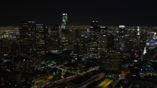 DCA01_012 - 5K aerial stock footage tilt up to reveal downtown Los Angeles skyscrapers, California