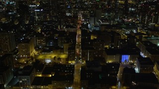 DCA01_016 - 5K aerial stock footage tilt up to reveal Downtown Los Angeles skyscrapers at night, California