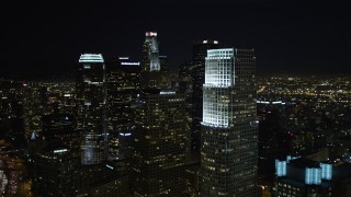 DCA01_023E - 5K aerial stock footage following Los Angeles Highway 110 at night, California