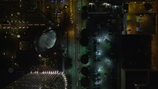 DCA01_037E - 5K aerial stock footage bird's eye view following South Figueroa Street at night, Downtown Los Angeles, California