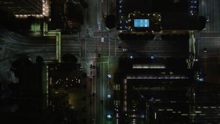 DCA01_040E - 5K aerial stock footage bird's eye view following South Figueroa Street in Downtown Los Angeles at night, California