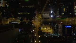 DCA01_044E - 5K aerial stock footage bird's eye view of Los Angeles Public Library, South Hope Street, at night California