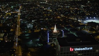 5K aerial stock footage flying by Downtown Los Angeles office towers at night, California Aerial Stock Footage | DCA01_058E