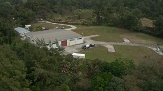 DCA02_033 - 4K aerial stock footage approach a small airfield in the New Territories, Hong Kong, China