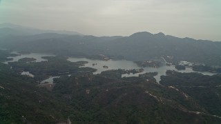 4K aerial stock footage approach Tai Lam Chung Reservoir in New Territories, Hong Kong, China Aerial Stock Footage | DCA02_064