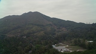 4K aerial stock footage approach a peak near Tai Po in New Territories, Hong Kong, China Aerial Stock Footage | DCA02_073