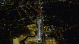 4K aerial stock footage of approaching top of Stratosphere, Las Vegas, Nevada Night Aerial Stock Footage | DCA03_004