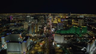 4K aerial stock footage of Las Vegas Boulevard past Excalibur, New York New York, MGM Grand, Las Vegas, Nevada Night Aerial Stock Footage | DCA03_015