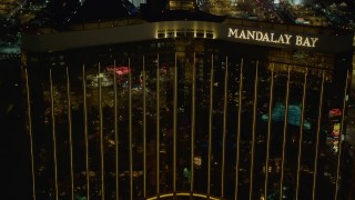 4K aerial stock footage of slowly ascending by Mandalay Bay, Las Vegas, Nevada Night Aerial Stock Footage | DCA03_055