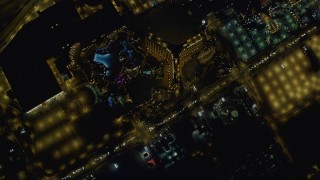 4K aerial stock footage of bird's eye view of Las Vegas Boulevard, orbiting Mandalay Bay, Nevada Night Aerial Stock Footage | DCA03_102