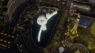 4K aerial stock footage of orbiting the water show at The Bellagio, Las Vegas, Nevada Night Aerial Stock Footage | DCA03_131