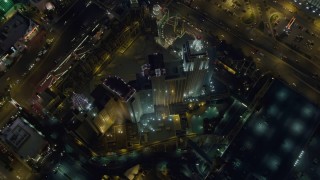 4K aerial stock footage of flying away from New York New York Hotel and Casino, Las Vegas, Nevada Night Aerial Stock Footage | DCA03_145