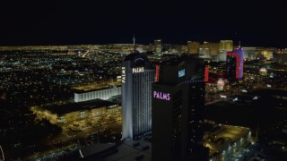 DCA03_153 - 4K aerial stock footage of orbiting Palms Casino Resort, Las Vegas, Nevada Night