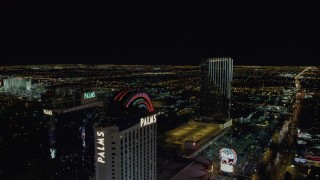 DCA03_154 - 4K aerial stock footage of flying by Palms Casino toward Palms Place Hotel and Spa, Las Vegas, Nevada Night