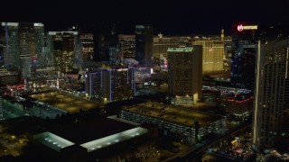 4K aerial stock footage of flying near hotels on Las Vegas Strip, Nevada Night Aerial Stock Footage | DCA03_166