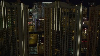 4K aerial stock footage of flying by the Signature at MGM Grand, Las Vegas, Nevada Night Aerial Stock Footage | DCA03_167