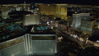 4K aerial stock footage of flying by The Mirage, toward Las Vegas Boulevard, Nevada Night Aerial Stock Footage | DCA03_180