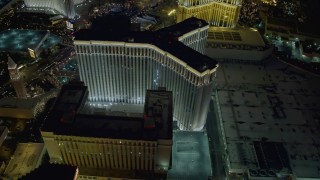 4K aerial stock footage of orbiting the back of The Venetian Resort and Casino, Las Vegas, Nevada Night Aerial Stock Footage | DCA03_185