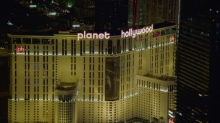 4K aerial stock footage of zooming closer to Planet Hollywood Resort and Casino, Las Vegas, Nevada Night Aerial Stock Footage | DCA03_198