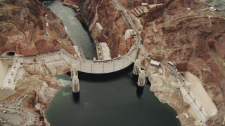 DCA04_011 - 4K aerial stock footage of flying away from Hoover Dam, Boulder City, Nevada