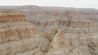 DCA04_028 - 4K aerial stock footage of rock walls and formations in Grand Canyon, Arizona