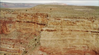 DCA04_046 - 4K aerial stock footage of flying by a cliff face in Grand Canyon, Arizona