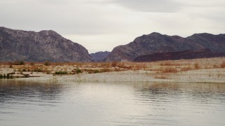 4K aerial stock footage of flying low over shore of Lake Mead, Nevada Aerial Stock Footage | DCA04_063