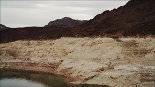 4K aerial stock footage of flying over shoreline in Lake Mead, Nevada Aerial Stock Footage | DCA04_064