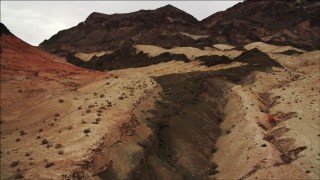 DCA04_069 - 4K aerial stock footage of flying over desert dunes near Hiller Mountains, Nevada