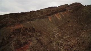 4K aerial stock footage of flying over a mountain ridge near Lake Mead, Nevada Aerial Stock Footage | DCA04_091