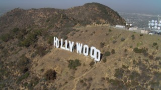 DCA05_007 - 4K aerial stock footage of orbiting the Hollywood Sign, Los Angeles, California