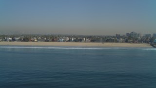 4K aerial stock footage of the beach seen from ocean, reveal Venice Fishing Pier, Venice, California Aerial Stock Footage | DCA05_075