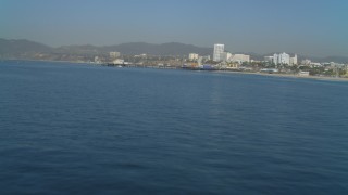 DCA05_079 - 4K aerial stock footage of Santa Monica State Beach, reveal Santa Monica Pier, Santa Monica, California